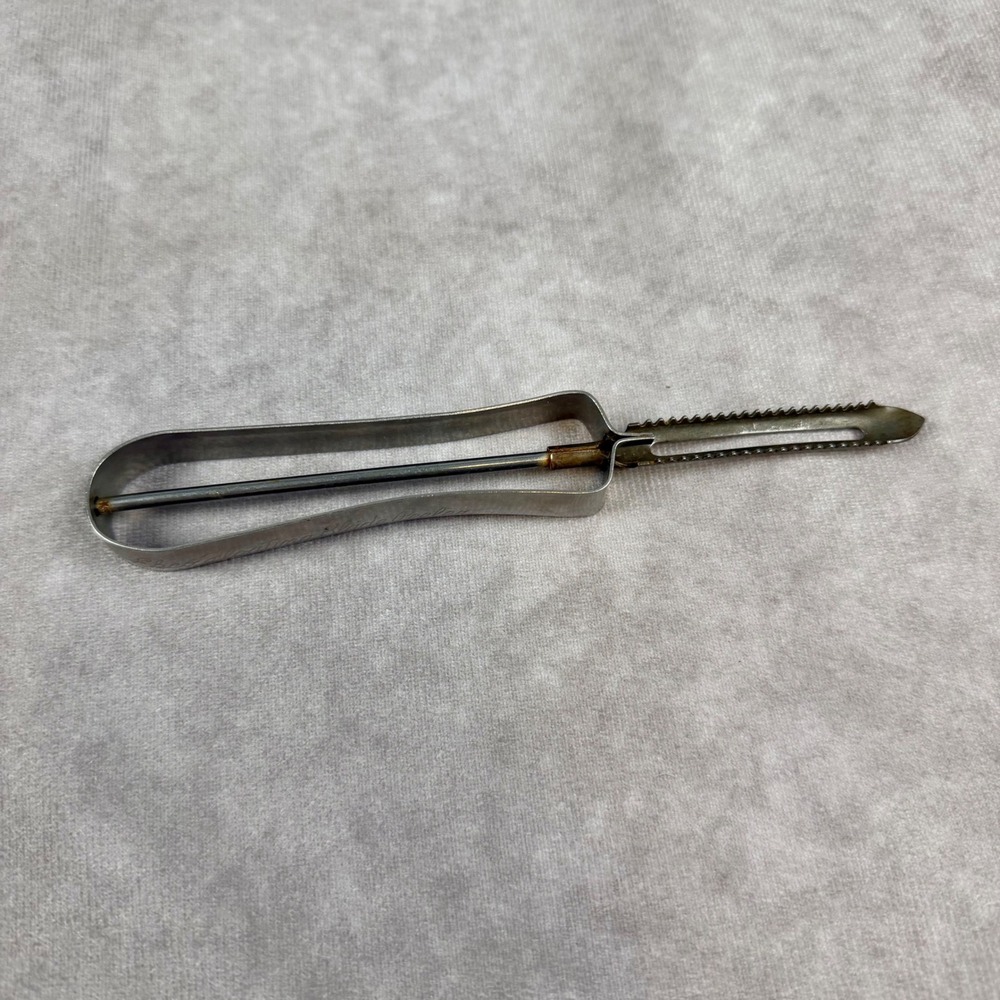 Vintage Ekco Floating Blade Peeler Stainless Steel USA Serrated Kitchen Tool